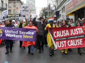 Occupiers march to an immigrant rights protest during the January 20 day of action in San Francisco